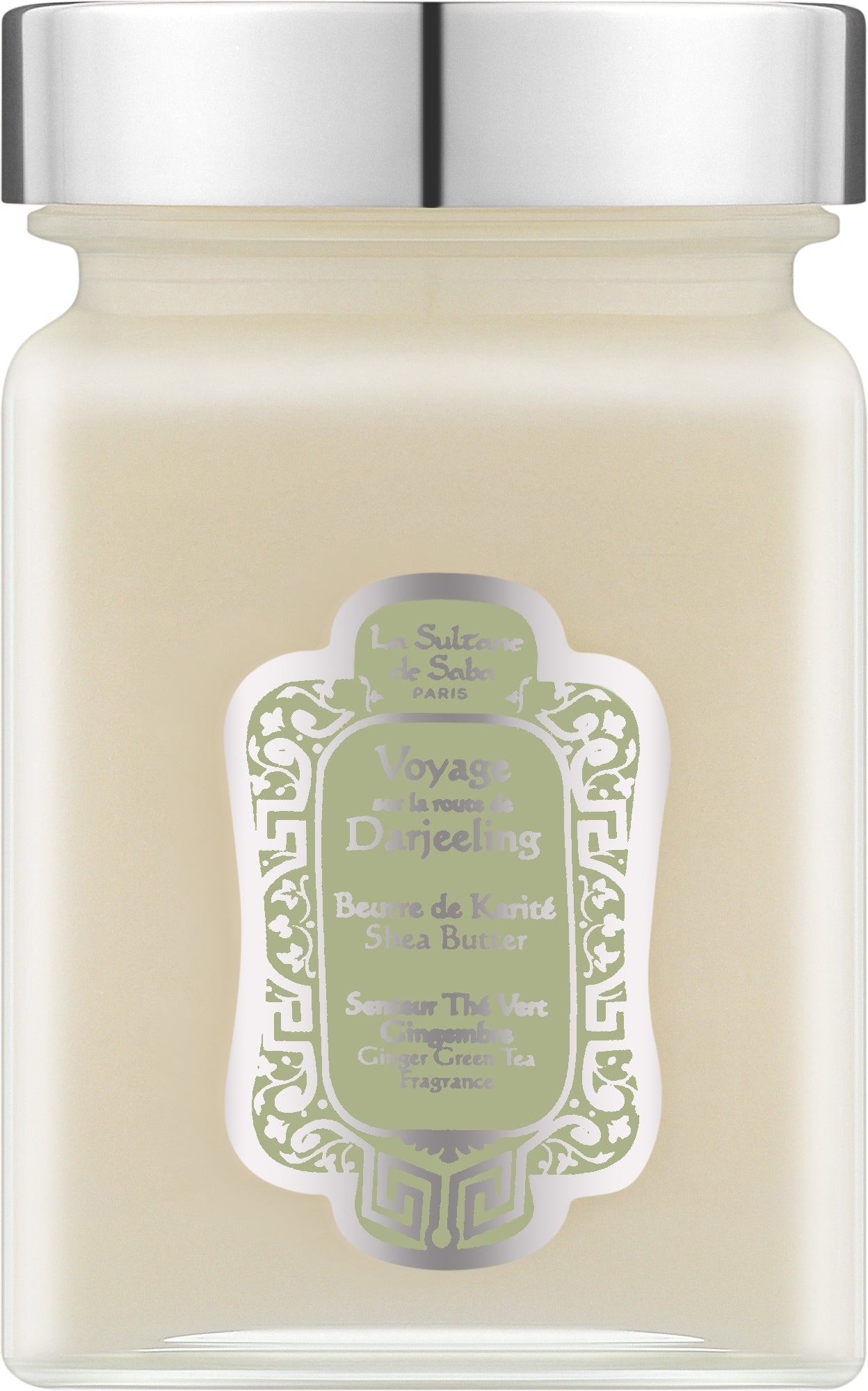 A jar candle with a silver metal lid and a cream-colored wax inside, featuring a decorative green and white label that reads 'Le Souffle du Sel Paris' and 'Voyage de la musc de D'arjeeling'.