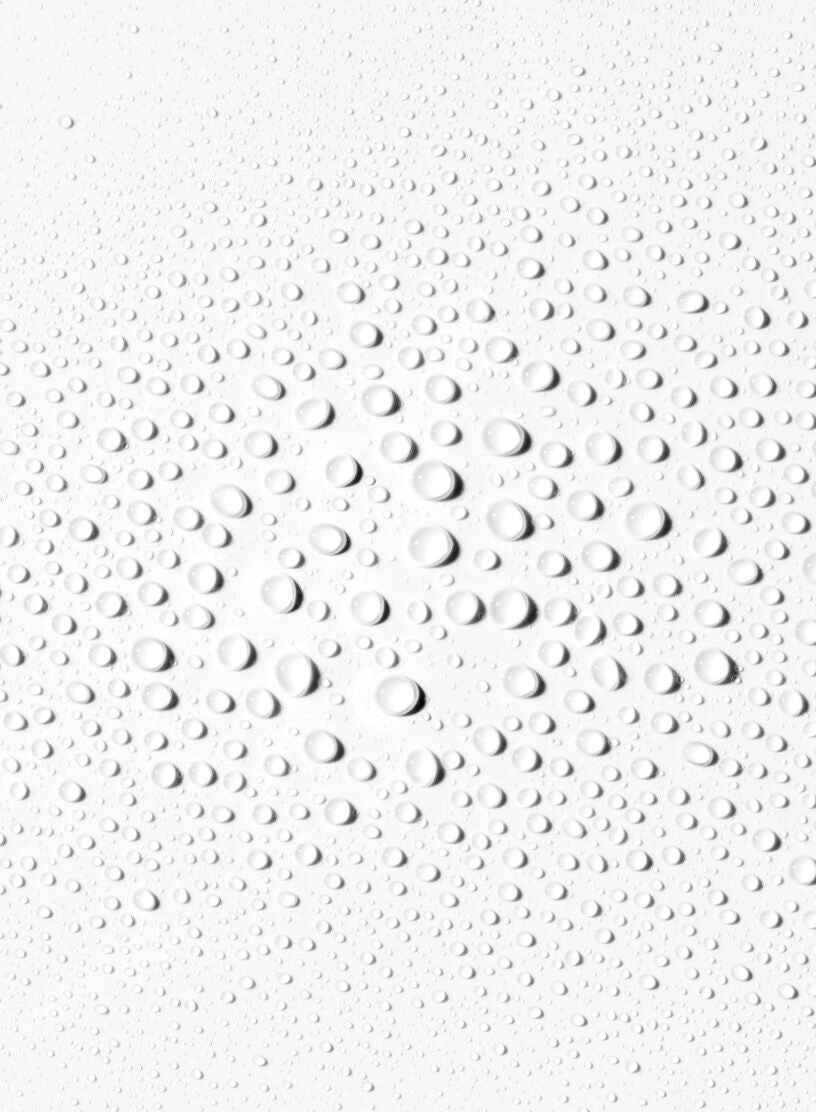 Textured white surface with circular patterns