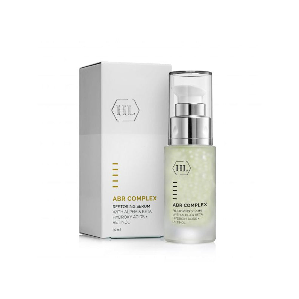 Skincare serum bottle with pump and ABR Complex label, plus matching product box